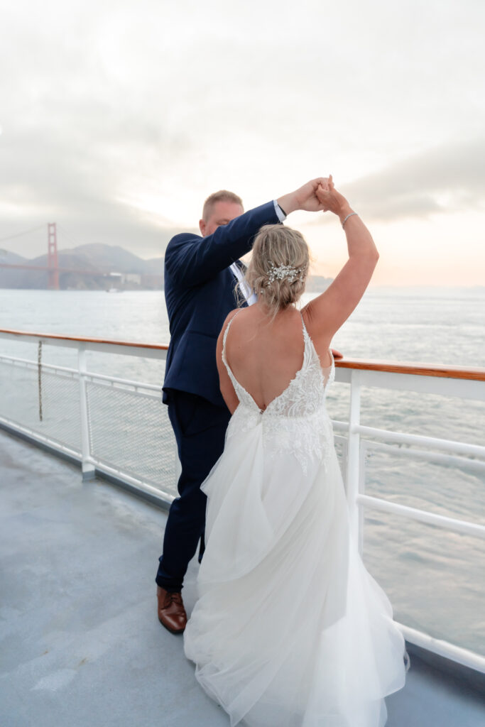 Bride and Groom dancing on boat